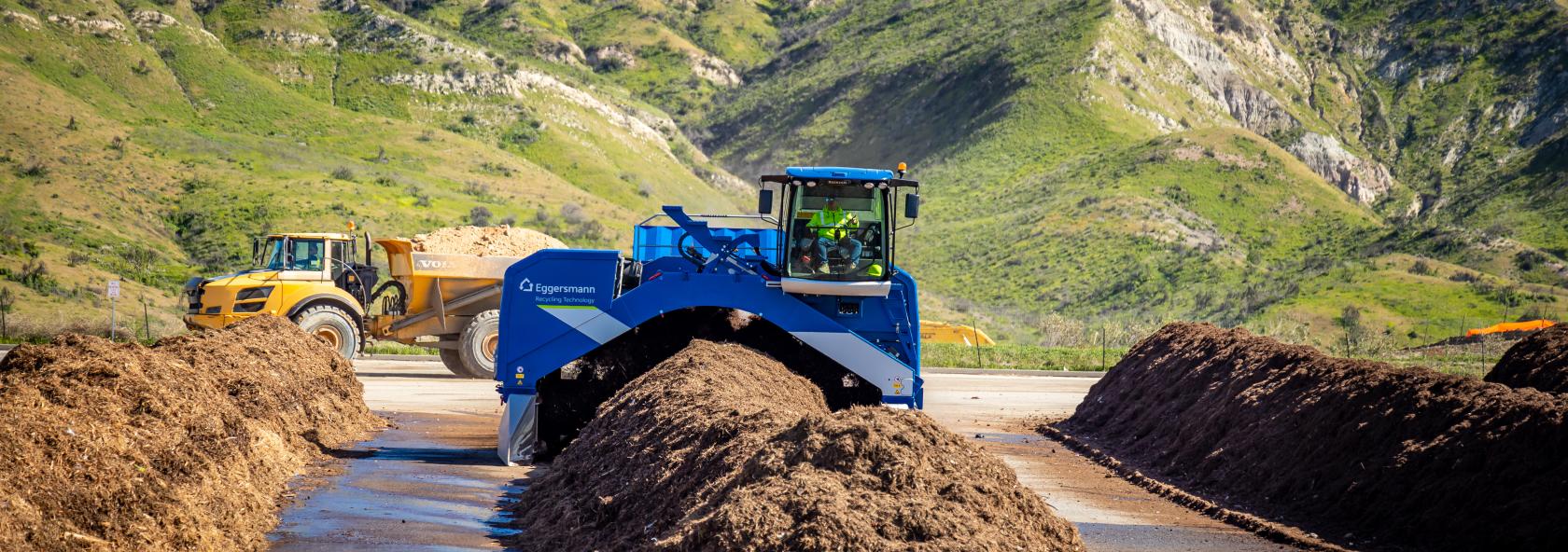 Compost turner on windrow.