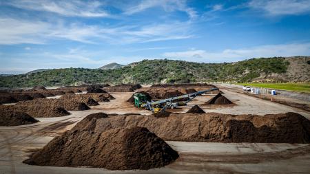 photo of Capistrano greenery with lines of compost at Prima site in San Juan Capistrano.