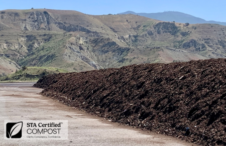 Pile of Compost at Prima Landfill site with STA certified logo